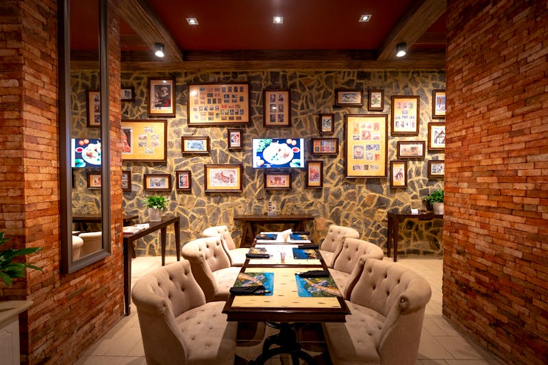 Interior of Davanni's restaurant — warm lighting, rustic wooden tables
